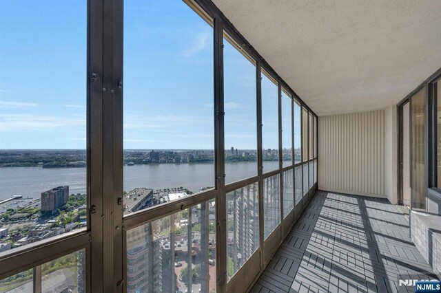 200 Winston Unit 2912, Cliffside Park, NJ 07010 - unfurnished sunroom featuring a water view