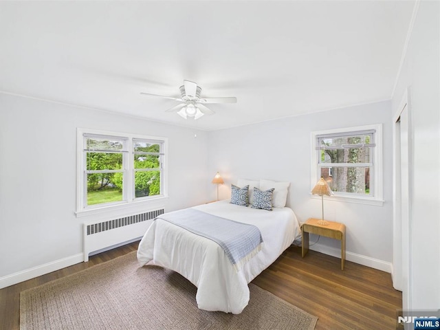 440 Albin Ct, Ridgewood, NJ 07450 - bedroom featuring radiator heating unit, baseboards, wood finished floors, and ceiling fan