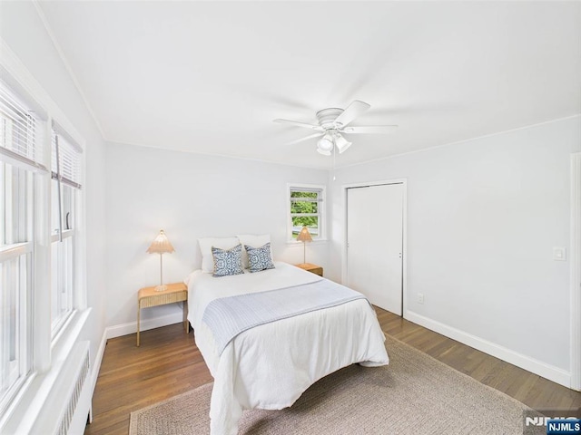 440 Albin Ct, Ridgewood, NJ 07450 - bedroom featuring wood finished floors, baseboards, radiator, and ceiling fan