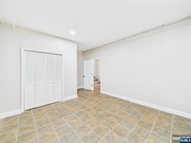 440 Albin Ct, Ridgewood, NJ 07450 - unfurnished bedroom with recessed lighting, baseboards, and a closet