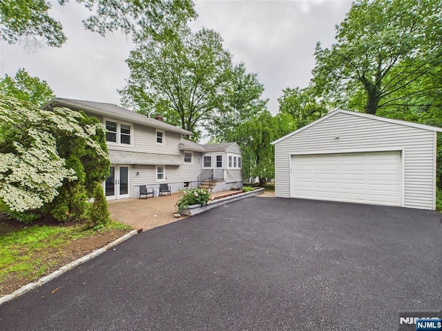 440 Albin Ct, Ridgewood, NJ 07450 - view of front of home featuring a garage and an outdoor structure
