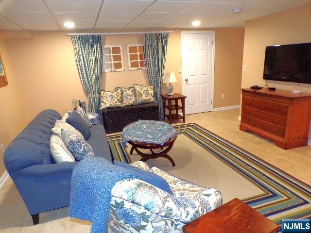 20 Carriage Ln, Ridgewood, NJ 07450 - living area featuring recessed lighting, tile patterned flooring, and baseboards