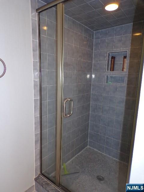 20 Carriage Ln, Ridgewood, NJ 07450 - full bathroom with a stall shower