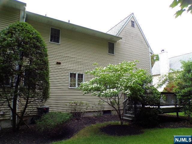 20 Carriage Ln, Ridgewood, NJ 07450 - view of home's exterior featuring a wooden deck