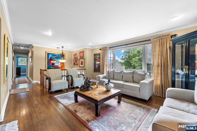 9 E Brook Dr, Paramus, NJ 07652 - living area with baseboards, ornamental molding, and dark wood-type flooring