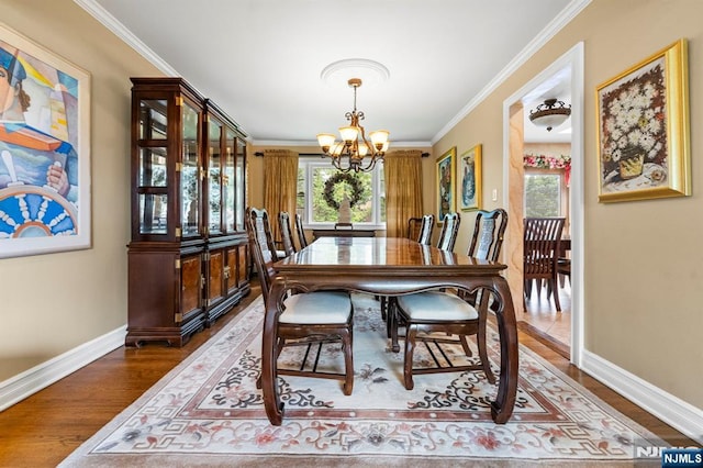 9 E Brook Dr, Paramus, NJ 07652 - dining area with a chandelier, baseboards, wood finished floors, and ornamental molding