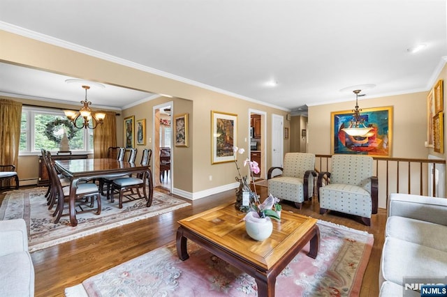 9 E Brook Dr, Paramus, NJ 07652 - living area with a chandelier, baseboards, dark wood-type flooring, and crown molding