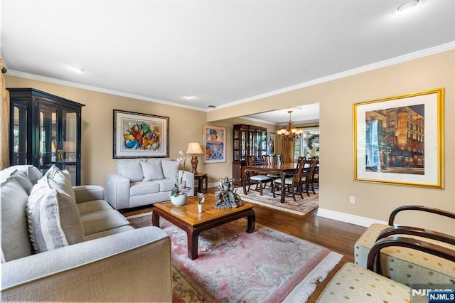 9 E Brook Dr, Paramus, NJ 07652 - living room with baseboards, a chandelier, dark wood-type flooring, and ornamental molding