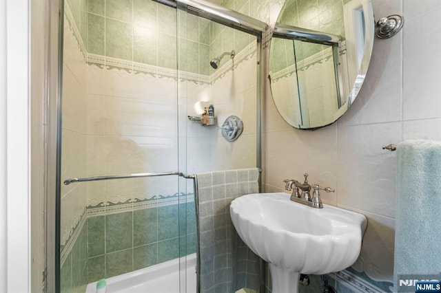 9 E Brook Dr, Paramus, NJ 07652 - full bath featuring tile walls, a shower stall, and a sink