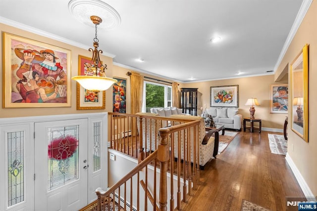 9 E Brook Dr, Paramus, NJ 07652 - foyer entrance with wood finished floors, baseboards, a baseboard heating unit, and crown molding