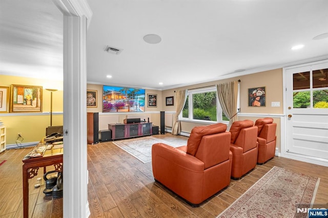 9 E Brook Dr, Paramus, NJ 07652 - living area featuring ornamental molding, wood finished floors, ornate columns, recessed lighting, and baseboards