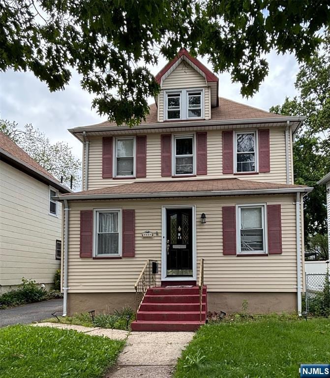 48 Elm St, Ridgefield Park, NJ 07660 - american foursquare style home with a front yard and entry steps