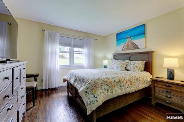 225 William St, River Vale, NJ 07675 - bedroom with dark wood finished floors and baseboards