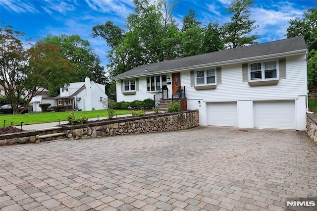 225 William St, River Vale, NJ 07675 - single story home featuring decorative driveway, a garage, and a front yard