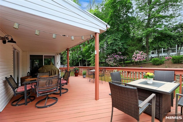 225 William St, River Vale, NJ 07675 - wooden terrace with outdoor dining space
