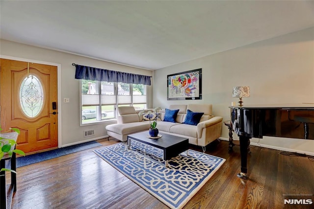 225 William St, River Vale, NJ 07675 - living area featuring plenty of natural light, wood finished floors, and baseboards