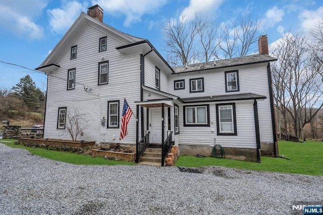18 Edge Hill Rd, Blairstown, NJ 07825 - view of front of property with a chimney and a front lawn