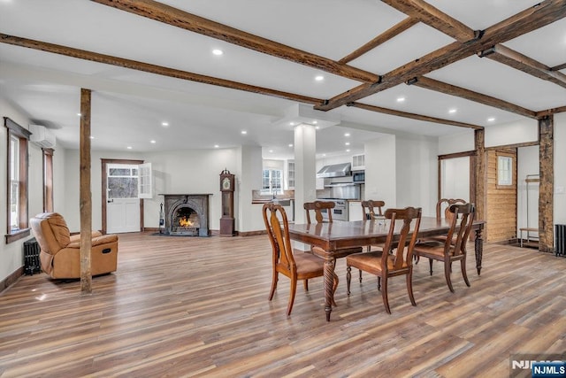 18 Edge Hill Rd, Blairstown, NJ 07825 - dining room featuring wood finished floors, plenty of natural light, a lit fireplace, beam ceiling, and recessed lighting
