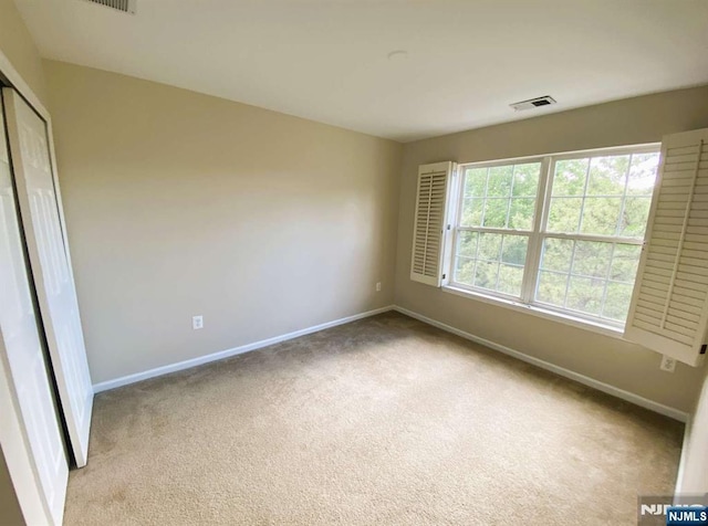 145 Riverwalk Way, Clifton, NJ 07014 - spare room with baseboards and carpet flooring