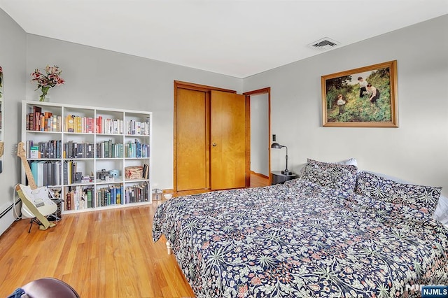 42 Cecilia Dr, Wayne, NJ 07470 - bedroom with wood finished floors and a closet
