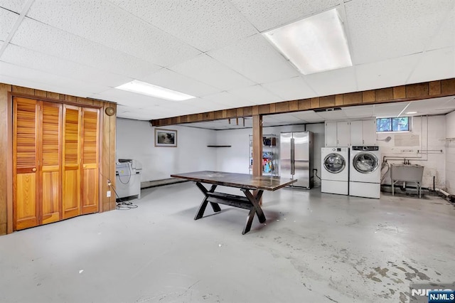 42 Cecilia Dr, Wayne, NJ 07470 - basement with built in refrigerator, washing machine and clothes dryer, a drop ceiling, and a sink