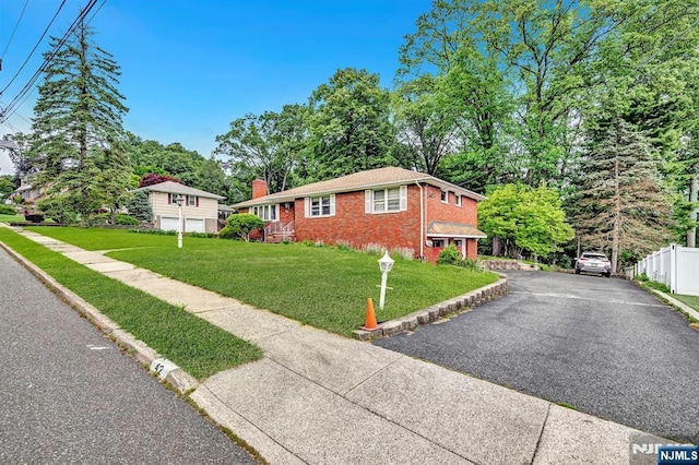 42 Cecilia Dr, Wayne, NJ 07470 - view of front of home with brick siding and a chimney