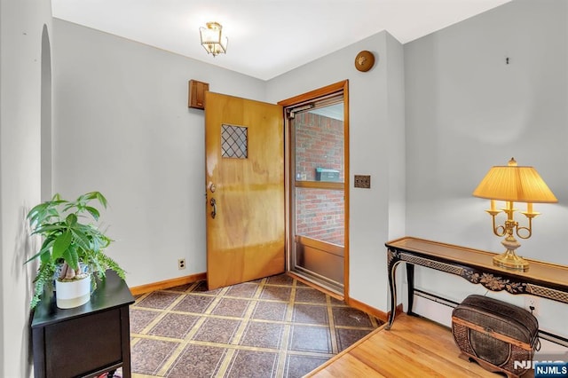 42 Cecilia Dr, Wayne, NJ 07470 - entryway featuring baseboards and a baseboard heating unit