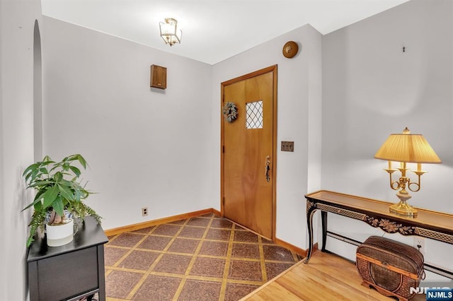 42 Cecilia Dr, Wayne, NJ 07470 - entrance foyer featuring baseboards and a baseboard heating unit