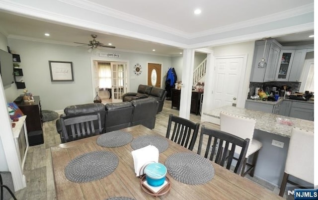 516 Beardsley Ave, Bloomfield, NJ 07003 - dining room with light wood-style flooring, stairs, crown molding, recessed lighting, and a ceiling fan