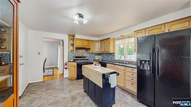 336 Ridgewood Blvd, Twp Of Washington, NJ 07676 - kitchen featuring black appliances, a sink, under cabinet range hood, decorative backsplash, and a baseboard heating unit