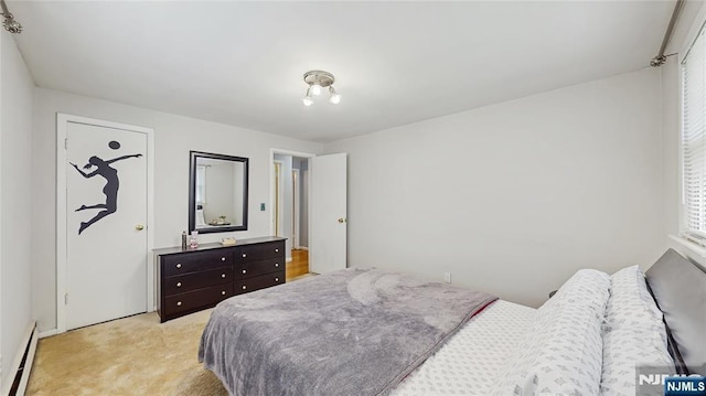 336 Ridgewood Blvd, Twp Of Washington, NJ 07676 - bedroom featuring a baseboard heating unit and light carpet