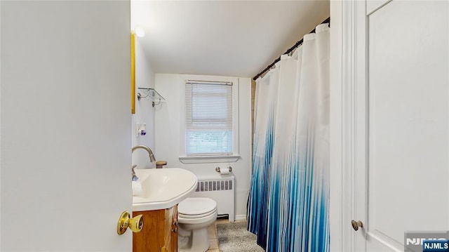 336 Ridgewood Blvd, Twp Of Washington, NJ 07676 - full bath with radiator heating unit, vanity, toilet, and curtained shower