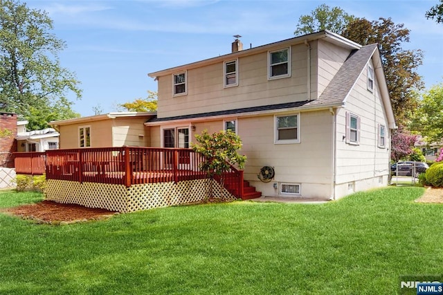 336 Ridgewood Blvd, Twp Of Washington, NJ 07676 - rear view of house with a deck, roof with shingles, a lawn, and a chimney