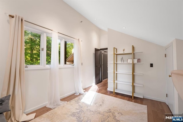 18 Lomas Ln, Montvale, NJ 07645 - doorway to outside featuring vaulted ceiling, wood finished floors, and baseboards