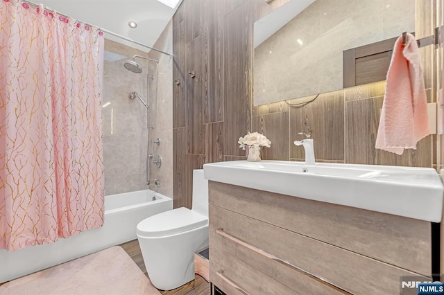 18 Lomas Ln, Montvale, NJ 07645 - full bathroom with shower / tub combo with curtain, vanity, toilet, tile walls, and wood finished floors