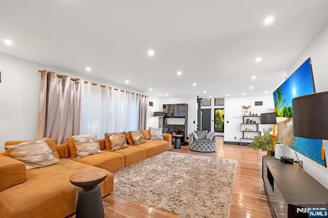 18 Lomas Ln, Montvale, NJ 07645 - living area with recessed lighting and light wood-style floors