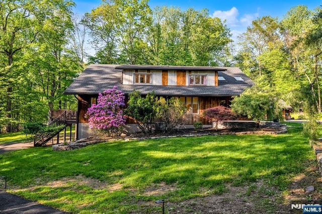 18 Lomas Ln, Montvale, NJ 07645 - view of front of home featuring a front yard, stairway, and a wooden deck