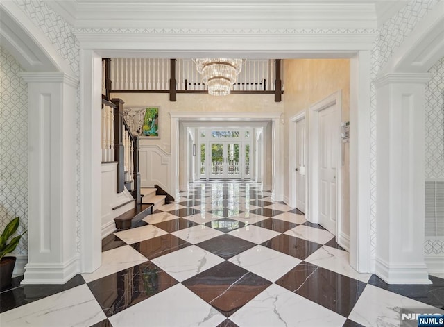1021 Hillcrest Rd, Ridgewood, NJ 07450 - entryway featuring stairway, wallpapered walls, a chandelier, baseboards, and decorative columns