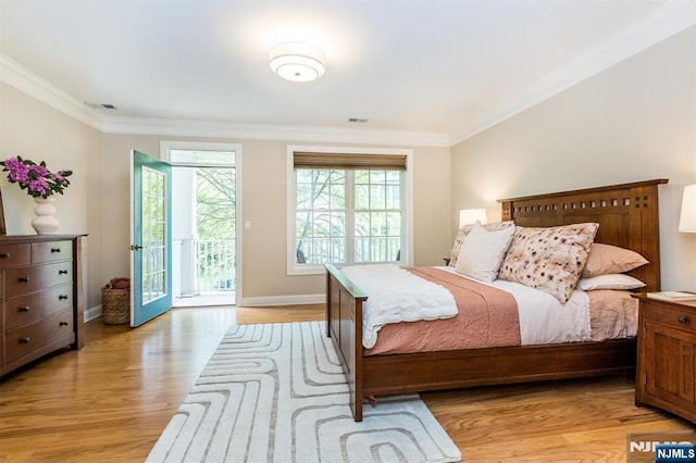 308 Holly Ln Unit 32, Cedar Grove, NJ 07009 - bedroom with ornamental molding, access to outside, light wood-type flooring, and baseboards