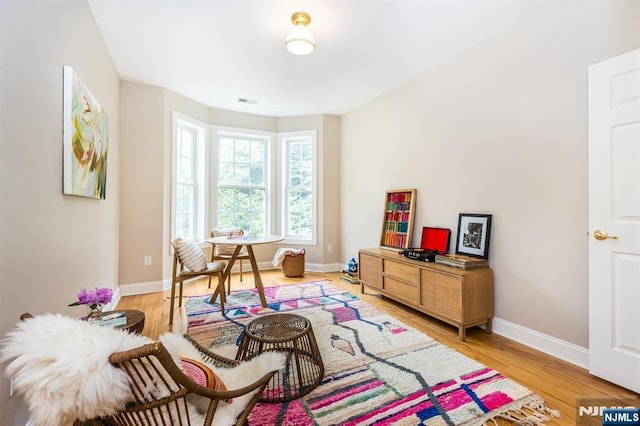 308 Holly Ln Unit 32, Cedar Grove, NJ 07009 - living area with light wood-style flooring and baseboards