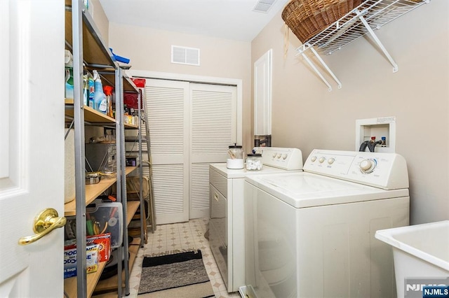 308 Holly Ln Unit 32, Cedar Grove, NJ 07009 - laundry area featuring separate washer and dryer and tile patterned floors