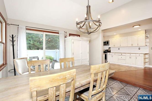 2 Hartland Ave, Emerson, NJ 07630 - dining room with a chandelier, light tile patterned floors, and recessed lighting