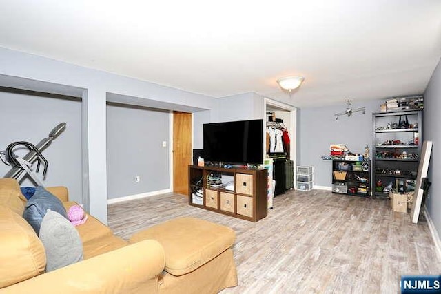2 Hartland Ave, Emerson, NJ 07630 - living room featuring wood finished floors and baseboards