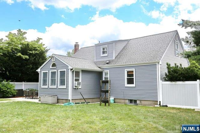 2 Hartland Ave, Emerson, NJ 07630 - back of property featuring a chimney, roof with shingles, and cooling unit