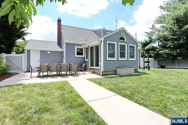 2 Hartland Ave, Emerson, NJ 07630 - back of house featuring a gate, a patio area, a chimney, and entry steps