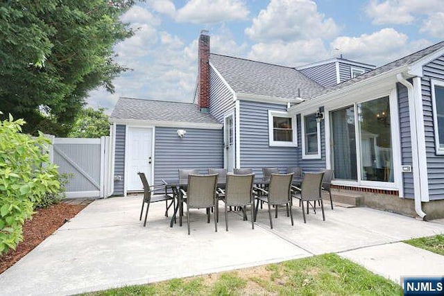 2 Hartland Ave, Emerson, NJ 07630 - view of patio with a gate and outdoor dining space
