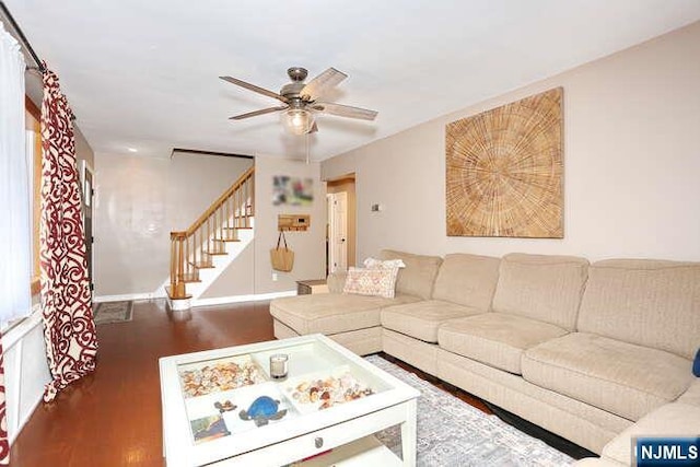 2 Hartland Ave, Emerson, NJ 07630 - living area with wood finished floors, baseboards, ceiling fan, and stairway