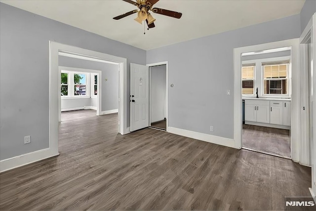 27 Berkeley Pl, Bloomfield, NJ 07003 - spare room featuring ceiling fan, baseboards, and dark wood finished floors