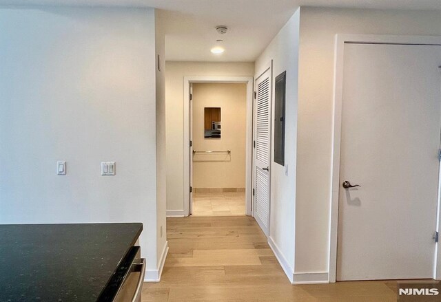 800 12th St Unit 207, Palisades Park, NJ 07650 - hallway with light wood-style floors, baseboards, and recessed lighting