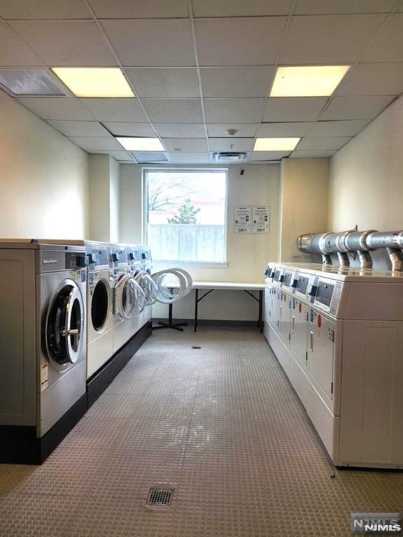 800 12th St Unit 207, Palisades Park, NJ 07650 - community laundry room featuring washer and dryer and light carpet
